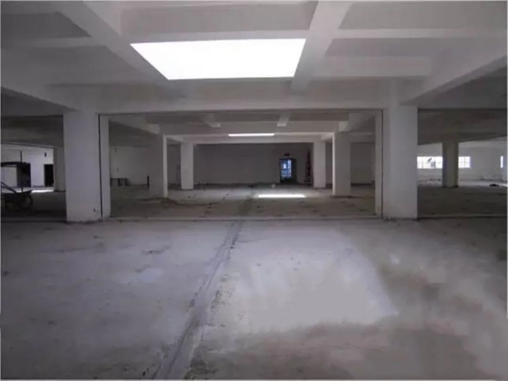 Professional base preparation and soil compaction before pouring steel fiber reinforced concrete floors