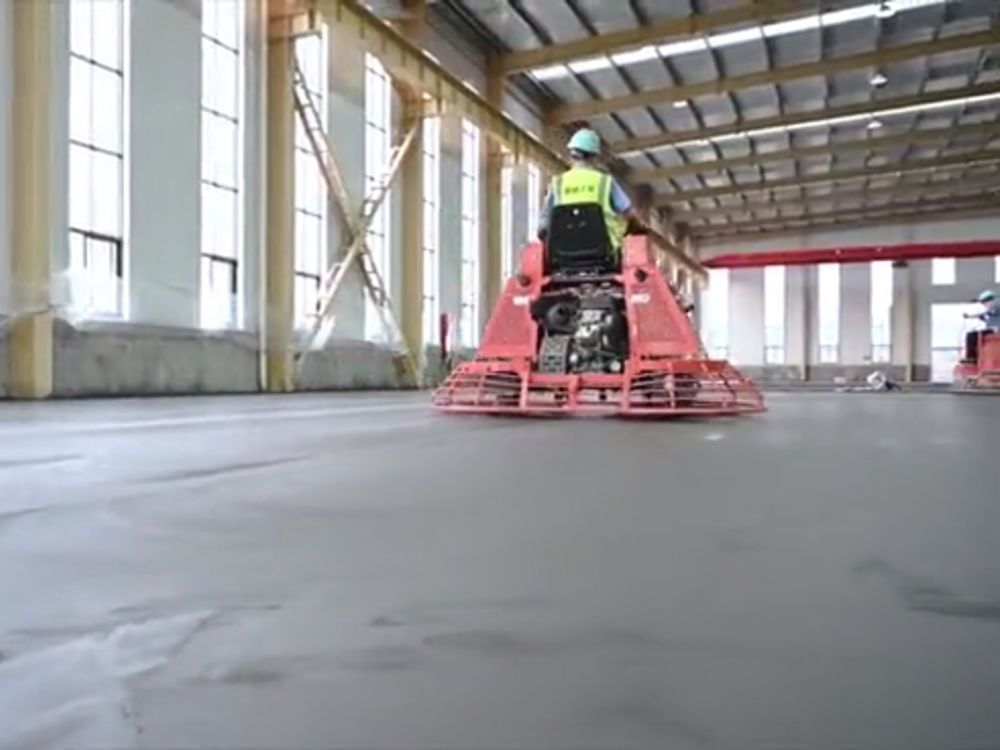 Fine polishing of steel fiber reinforced concrete (SFRC) slab to achieve a high-gloss industrial finish